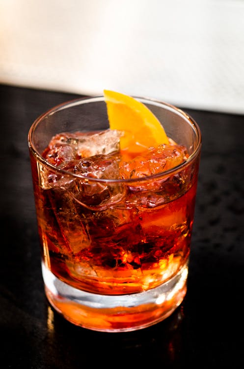 Negroni with Big Ice Cube and Saffron on Top in Vintage Glass Stock Image -  Image of vintage, whiskey: 217568501