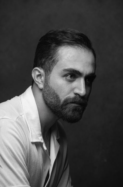 Free Expressive black and white portrait of a bearded man captured in a classic style. Stock Photo