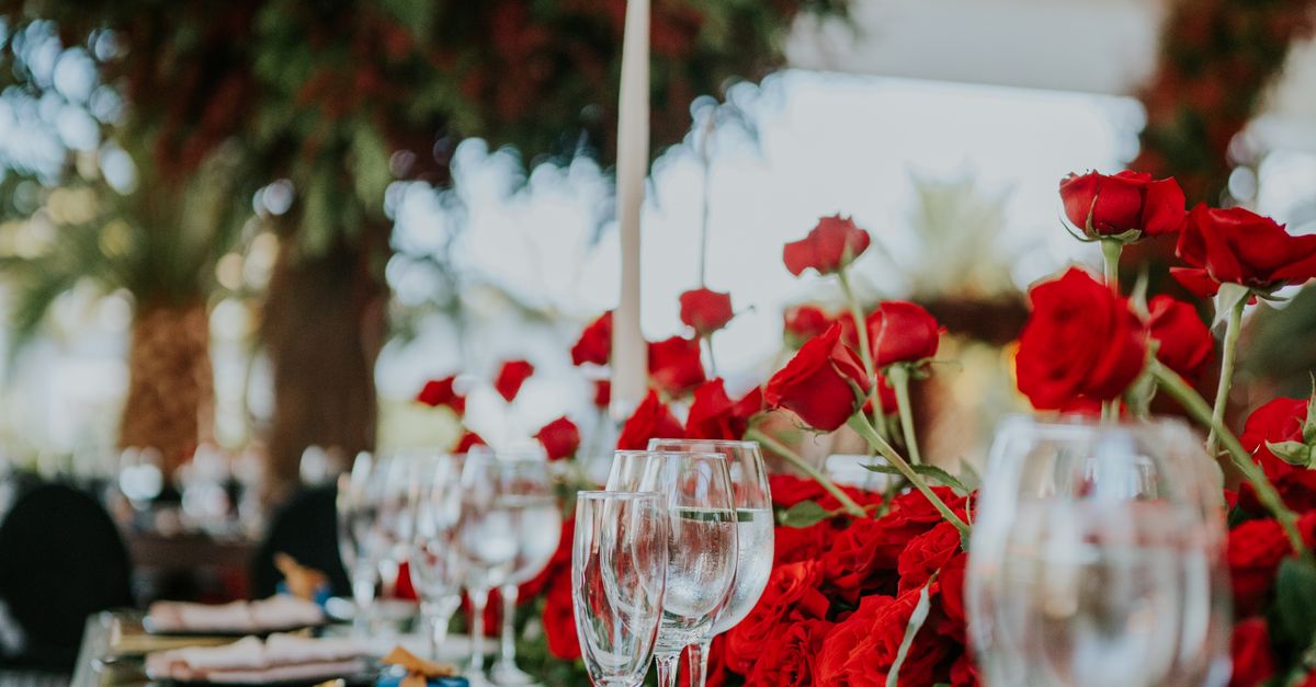 Cocktail Table Red Roses A Table Setup with Red Roses · Free Stock Photo