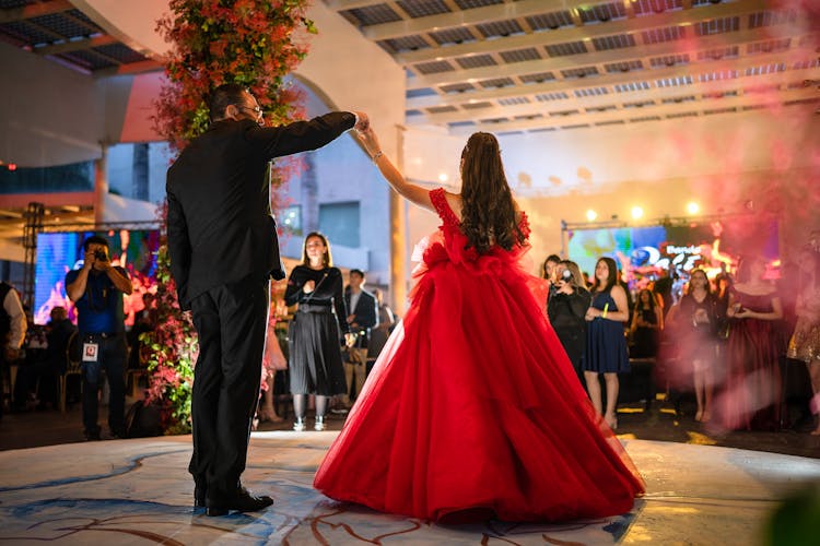 A Man And Woman Dancing Together 