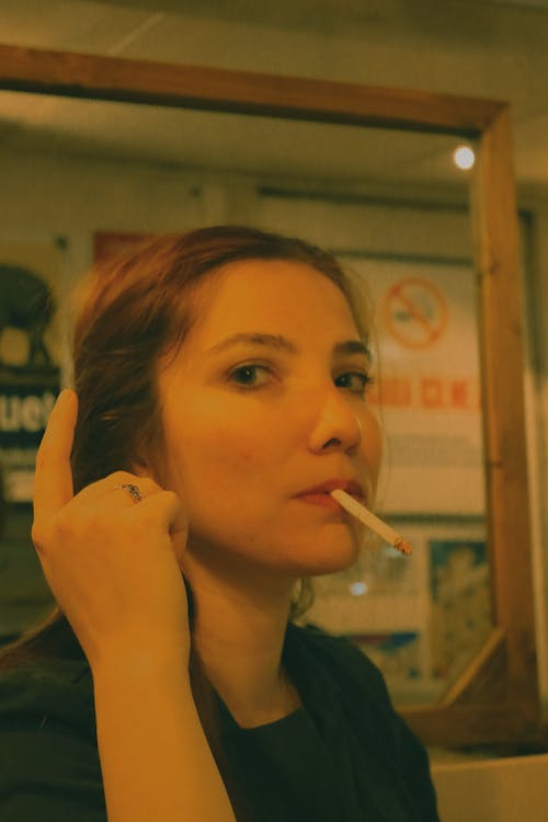 A Woman Smoking a Cigarette