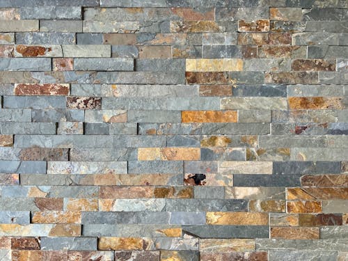 A Wall Covered with Multi Color Stone Tiles