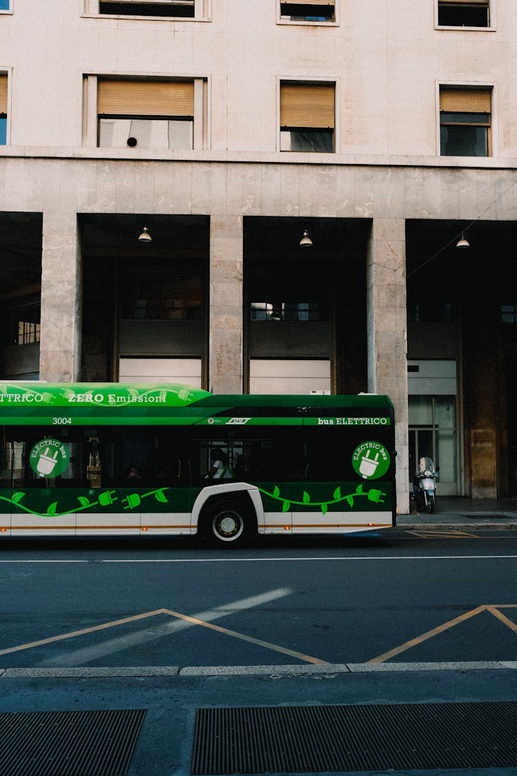 Side View Of A Bus On The Road 