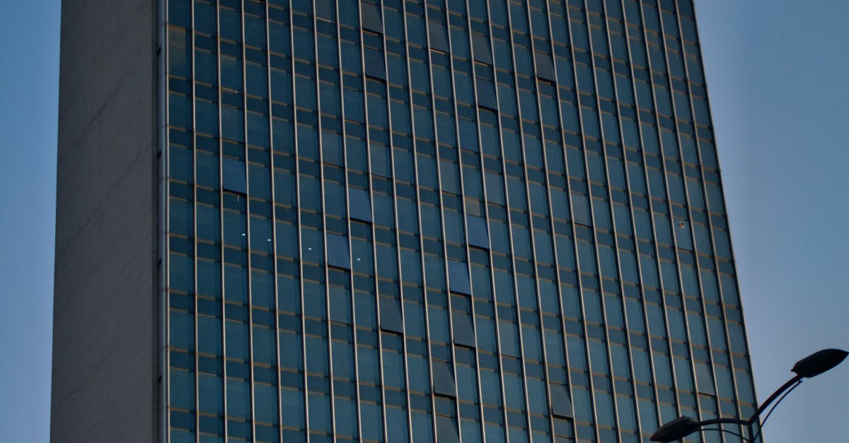 High Rise Building With Glass Panel Windows · Free Stock Photo