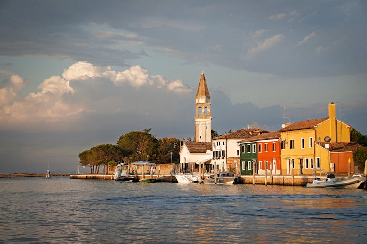 Church Of Saint Martin Bishop Near Colorful Houses Under Blue Sky