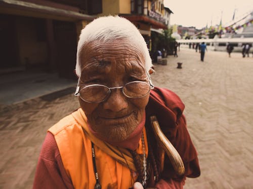 Free Portrait of an Elderly Woman with Eyeglasses Stock Photo