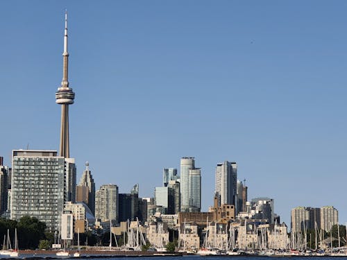 Free City Buildings under a Clear Blue Sky Stock Photo