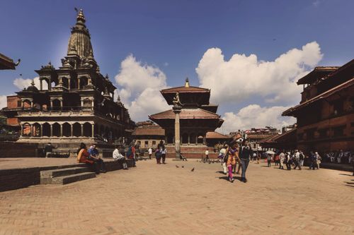 Free Explore the ancient architecture and vibrant life at Patan Durbar Square in Nepal. Stock Photo