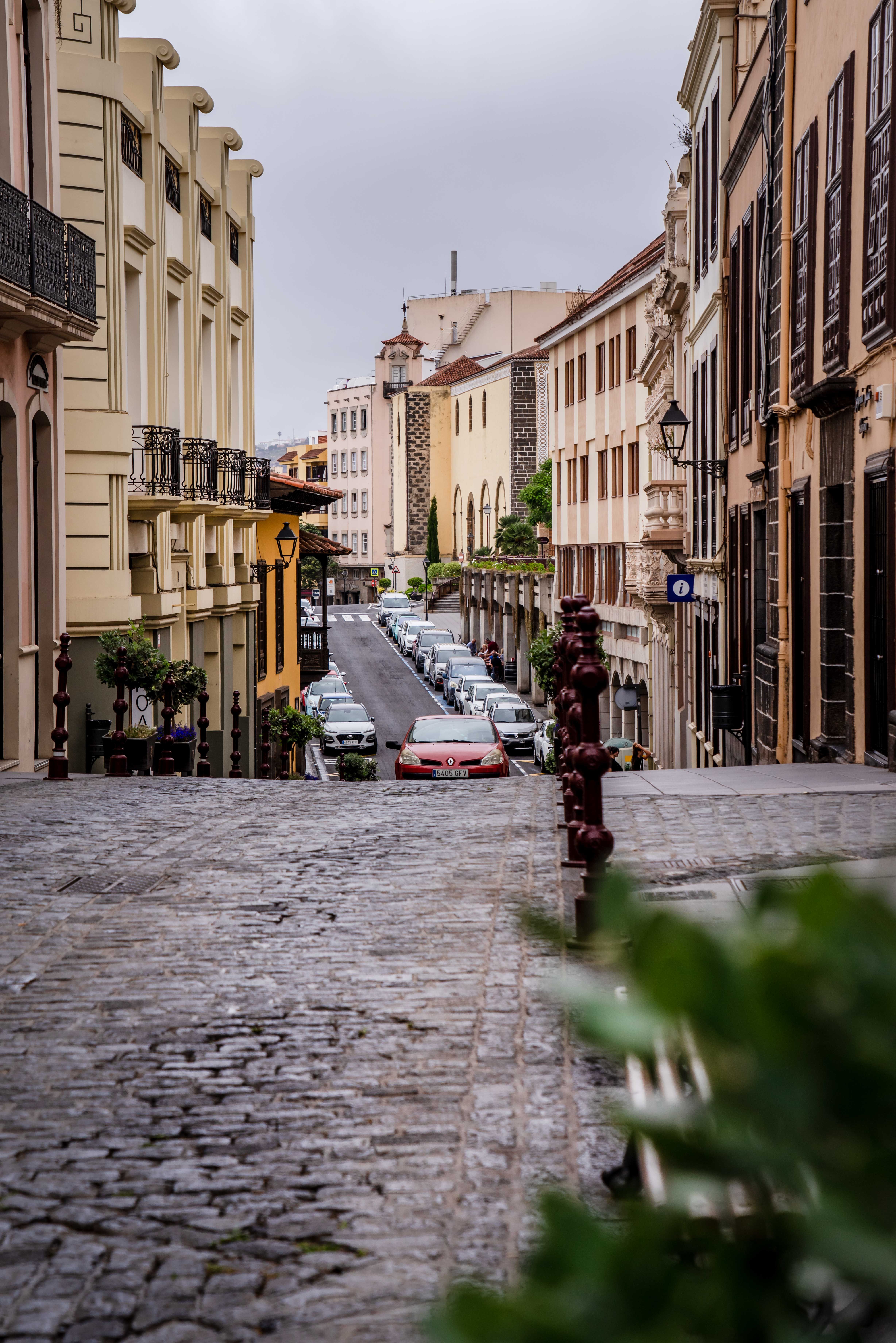 A Photo of Cobblestone Street Between Buildings · Free Stock Photo