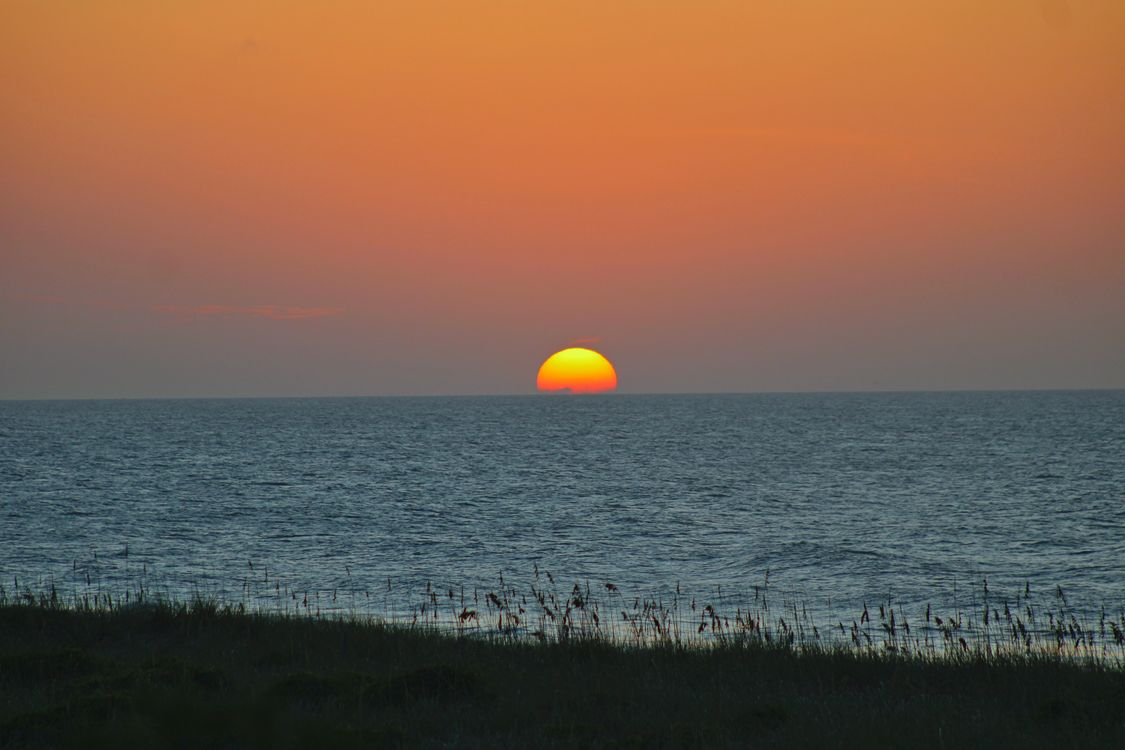 Sea Setting Example Sun Setting on the Sea · Free Stock Photo