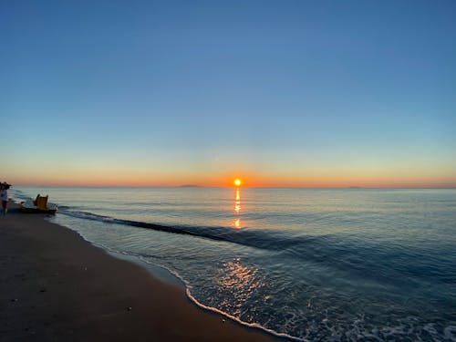 無料 ゴールデンアワー, ビーチ, 夕日の無料の写真素材 写真素材