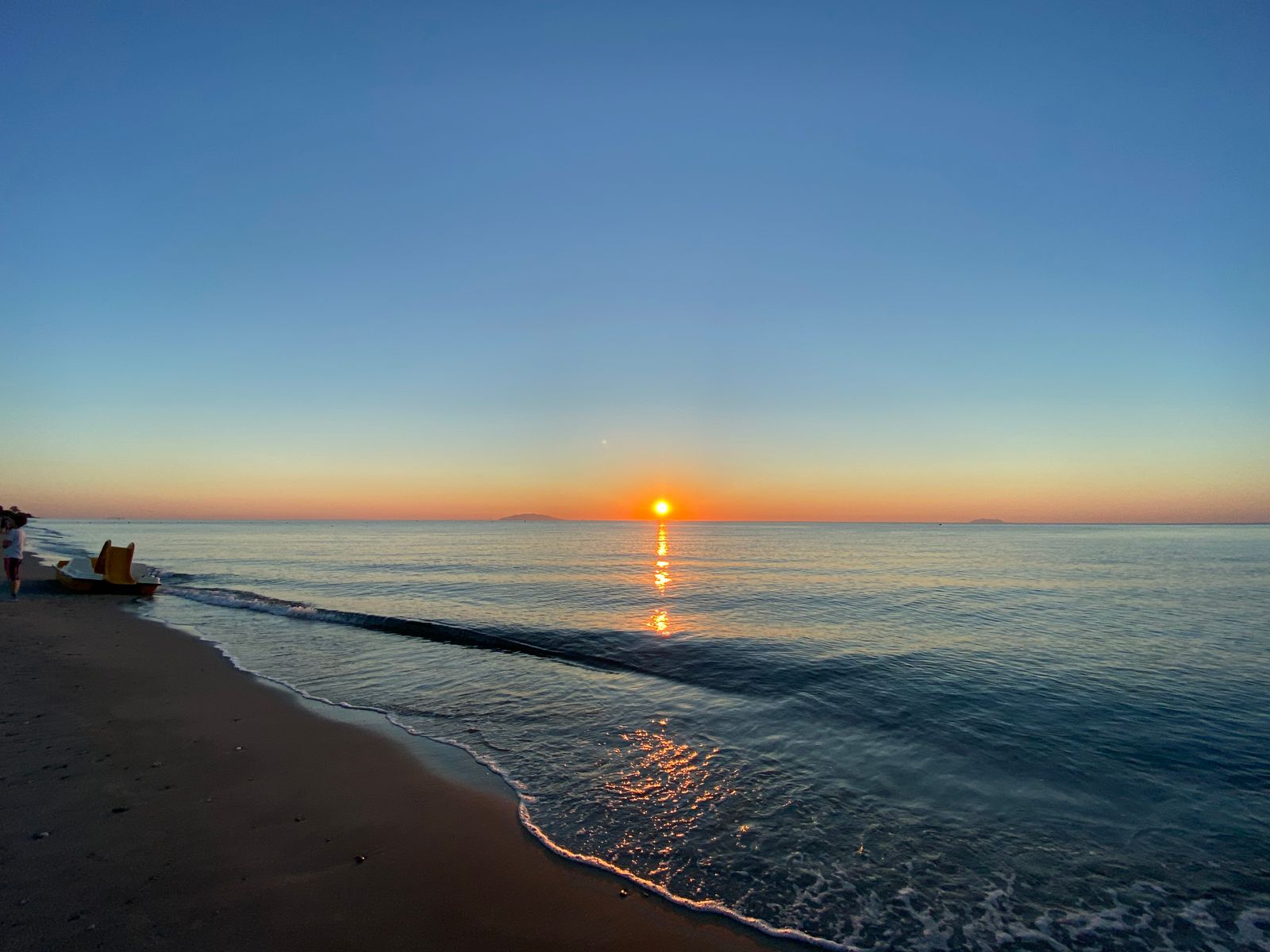 Tranquil beach at sunrise