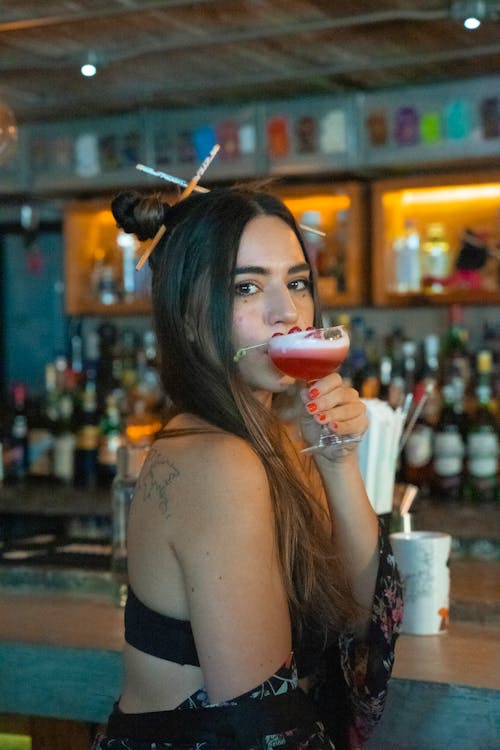 A Woman Drinking Cocktail