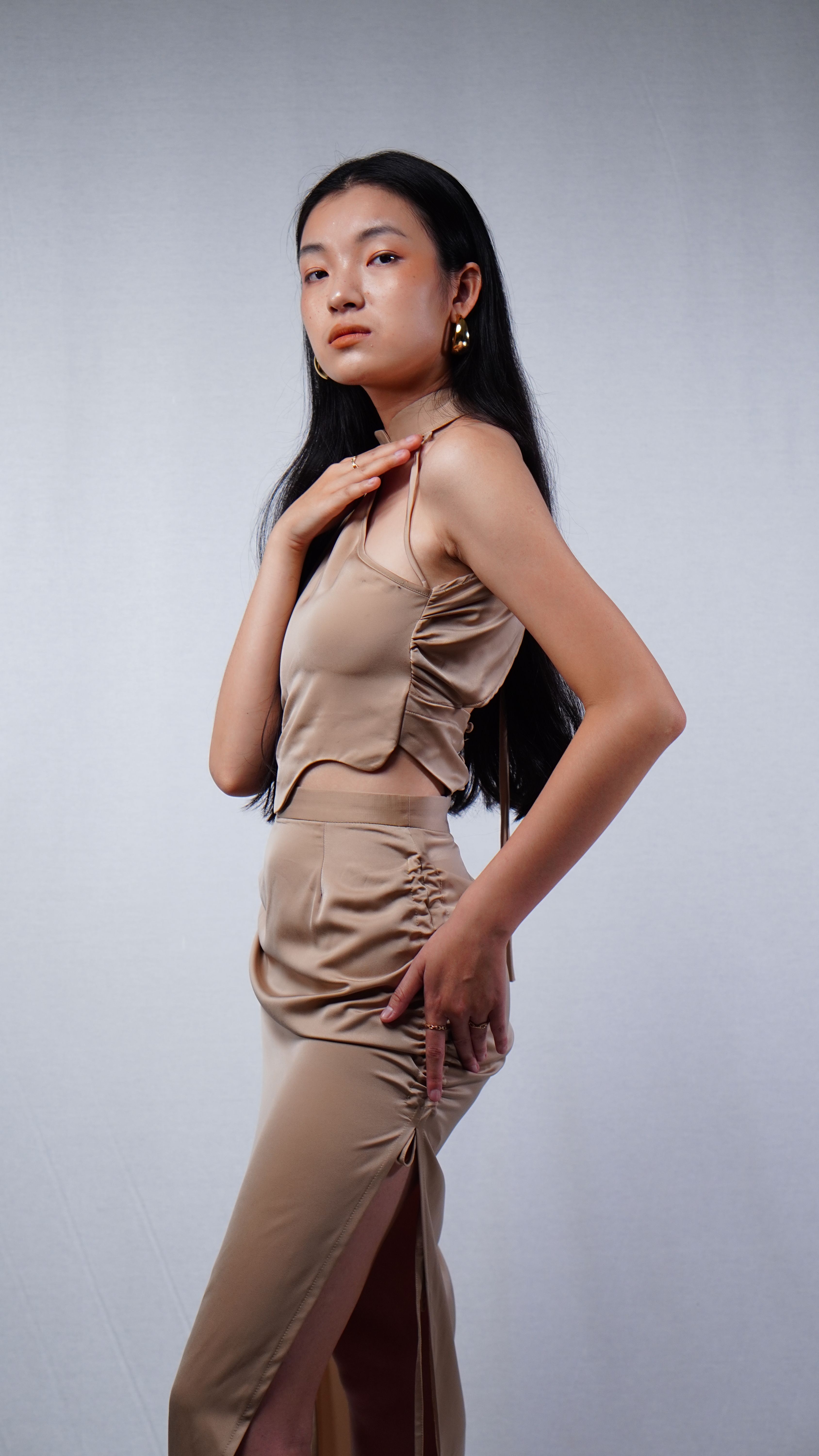 Elegant studio portrait of a female fashion model