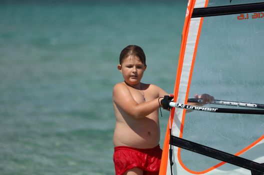 A Boy Doing Sailboarding