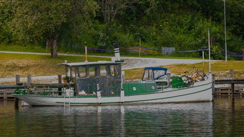 A Boat Docked on the Lake