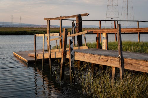 Brown Wooden Dock on Body of Water