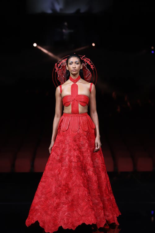 Model in Red Dress on Catwalk