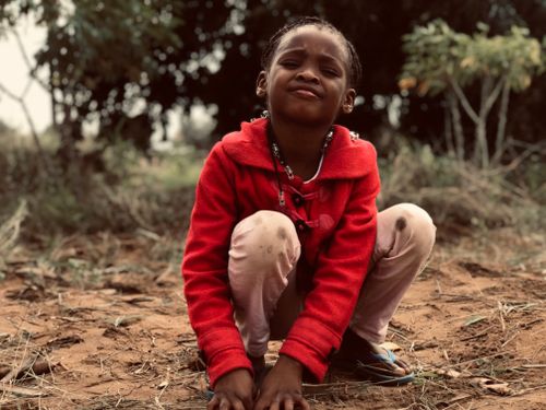 Free African Child In the Woods Stock Photo