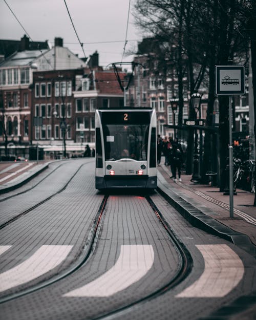Kostnadsfri bild av amsterdam, byggnader, kollektivtrafik