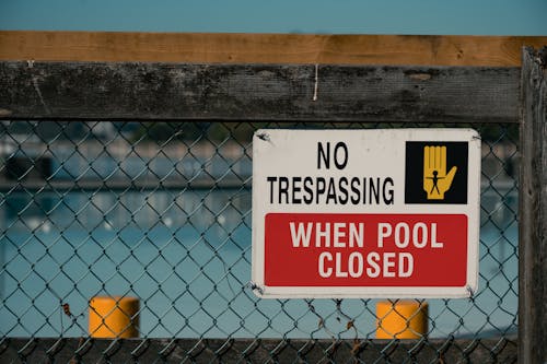 Free Photo of No Trespassing Pool Sign Stock Photo