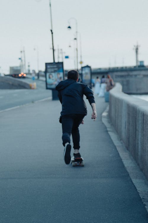 Man Riding a Skateboard