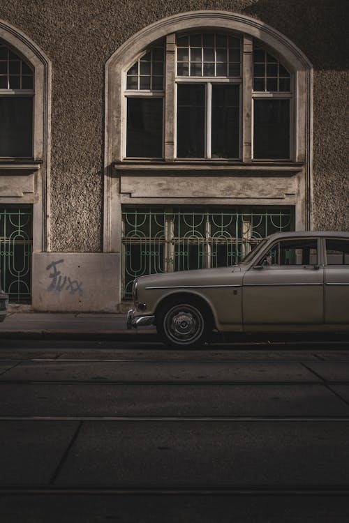 Silver Old-fashioned Car on Street