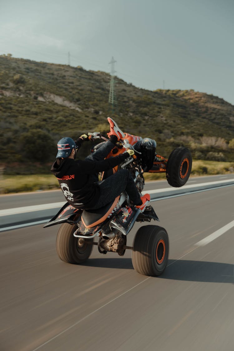 Man On Truck Racing On Road