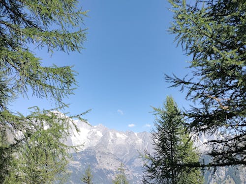 Gray Rocky Mountain Under the Blue Sky