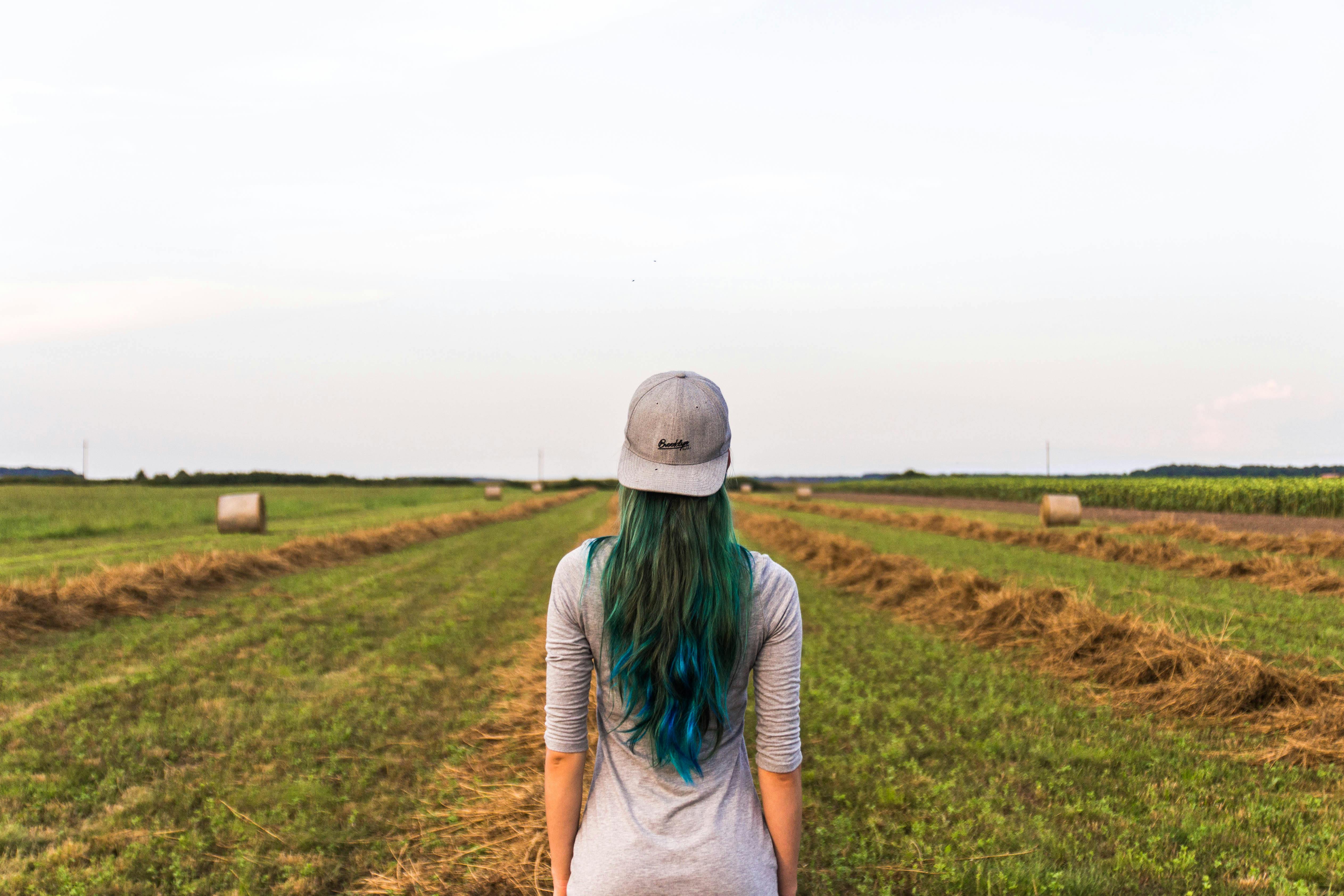 Woman Standing on Pasture \u00b7 Free Stock Photo