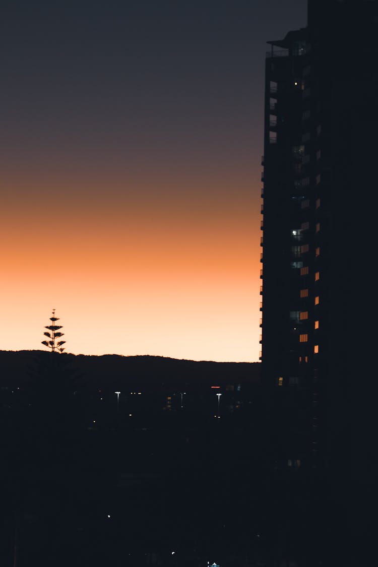 Silhouette Of Buildings During Sunset