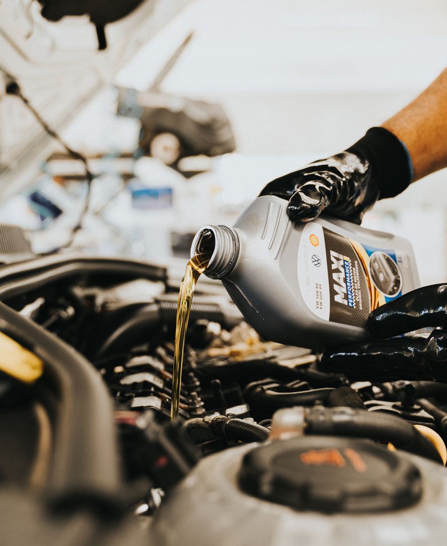 Range of Guangzhou Bodi lubricant products — engine, hydraulic and gear oils in branded packaging