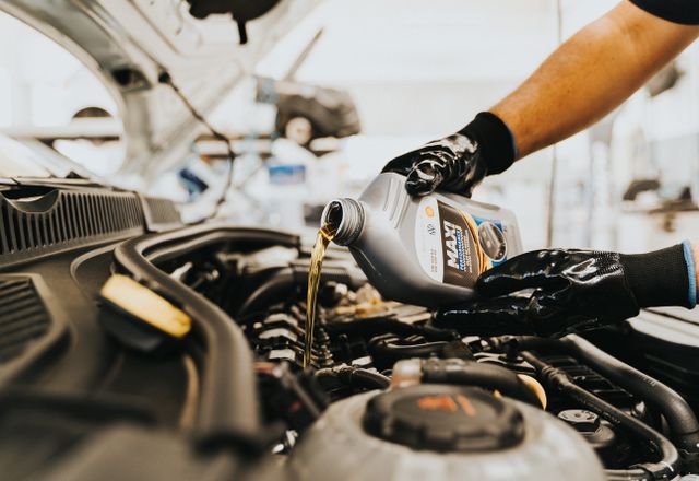 Fresh engine oil being poured