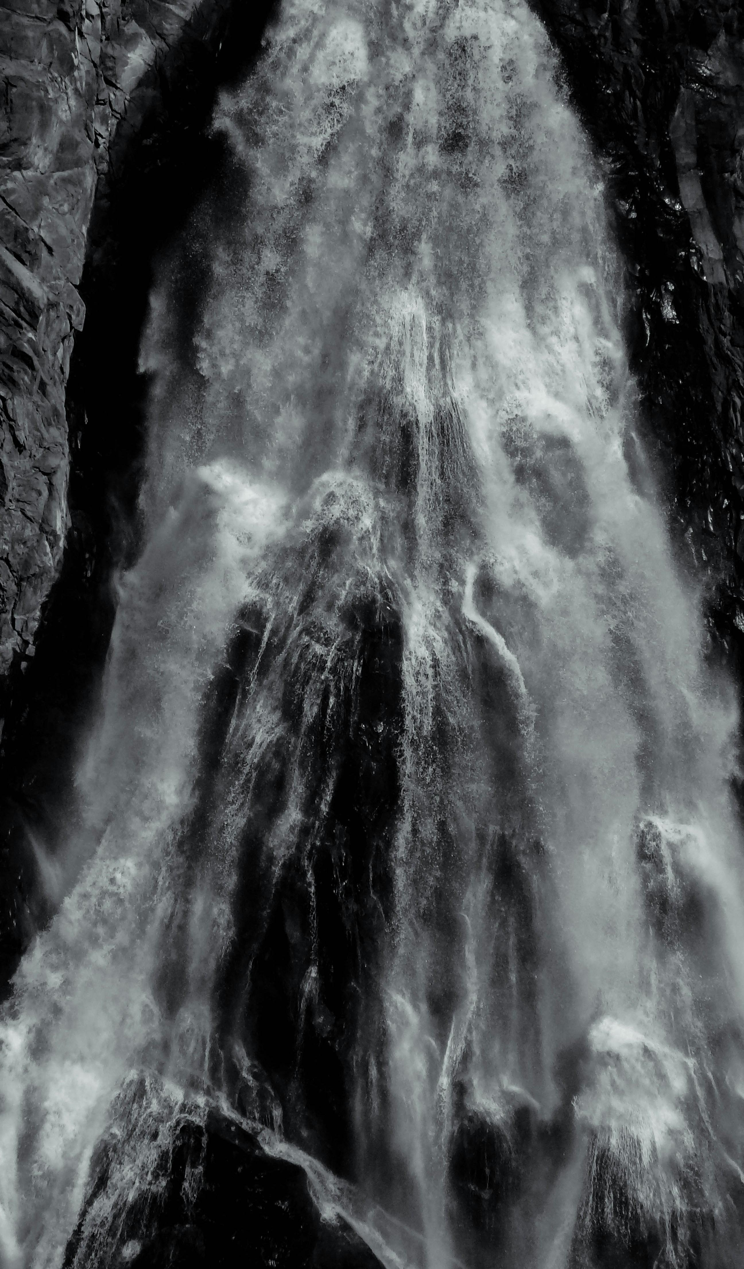 Grayscale Photo of a Waterfall · Free Stock Photo