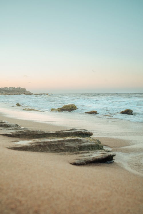 Foto d'estoc gratuïta de capvespre, hora daurada, mar