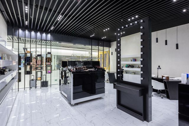Contemporary beauty hall with lit display units &mdash; photo by Max Vakhtbovych on Pexels