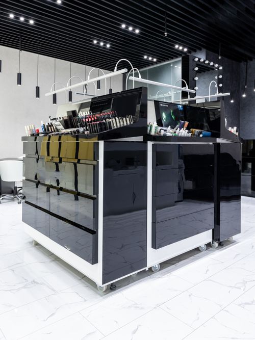 Free Sleek and stylish cosmetic display in a contemporary hair salon with glossy shelves. Stock Photo