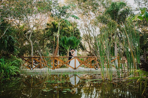 Bride and Groom on a Footbridge