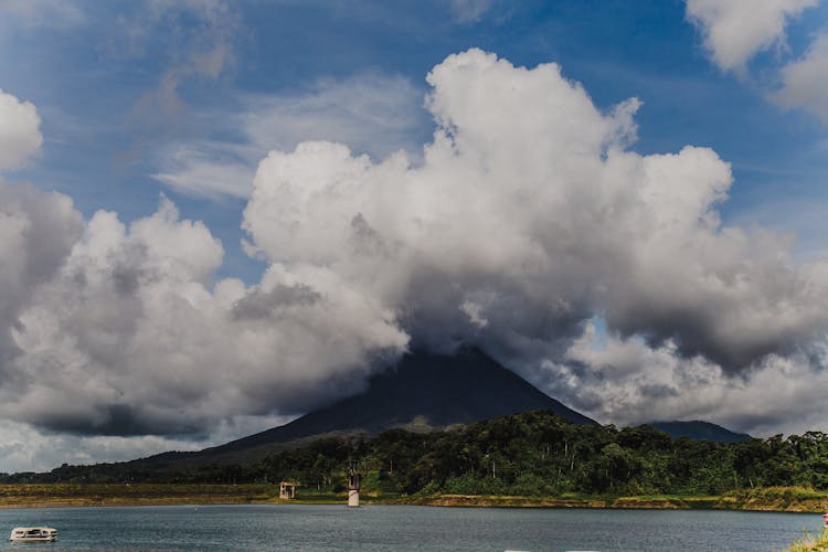 White Clouds Over The Arenal Volcano