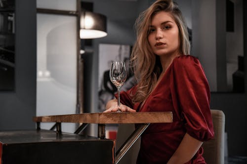 Beautiful Woman in Red Silk Dress