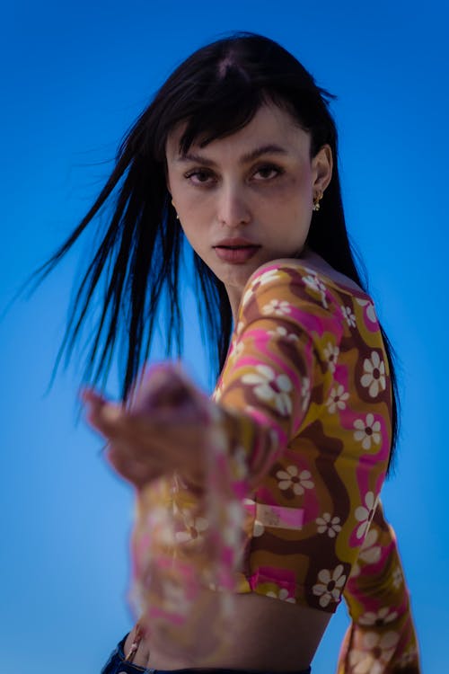 A Woman in a Floral Top