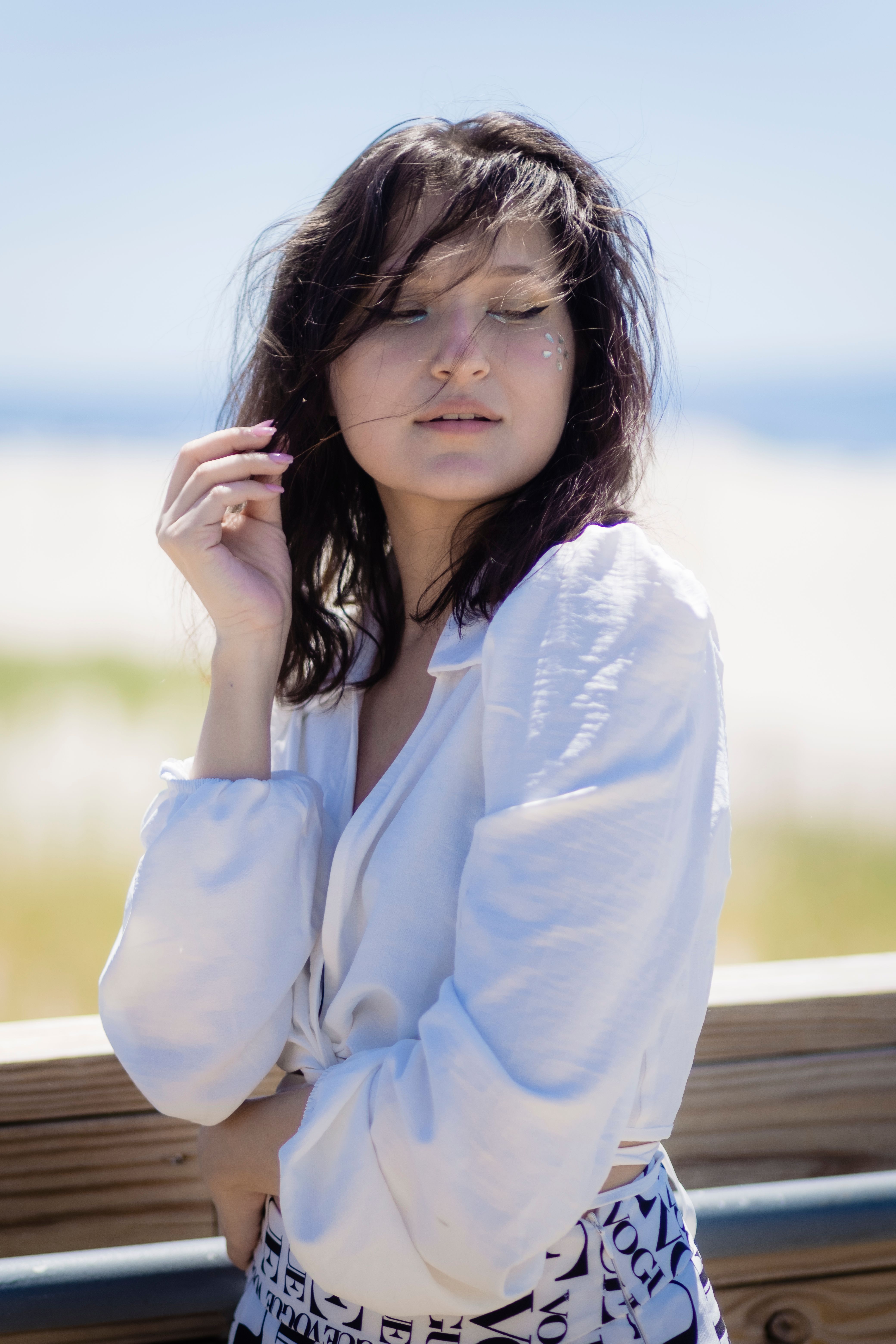 Woman in White Long Sleeve Shirt · Free Stock Photo