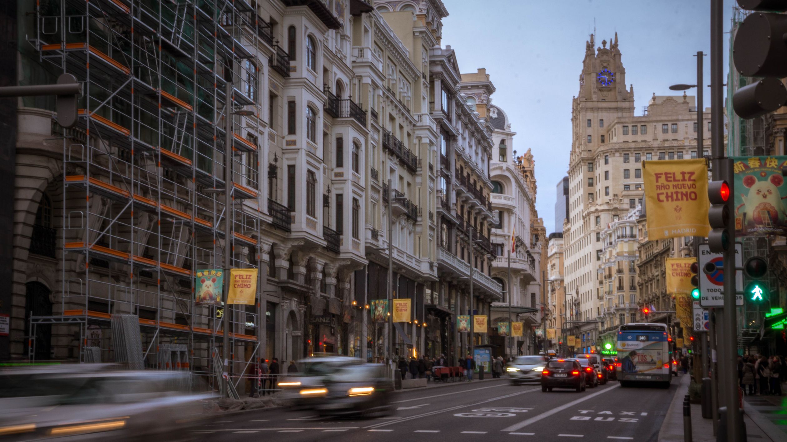 View of Gran Via street in Madrid featuring iconic Telefonica Building and urban scenery.