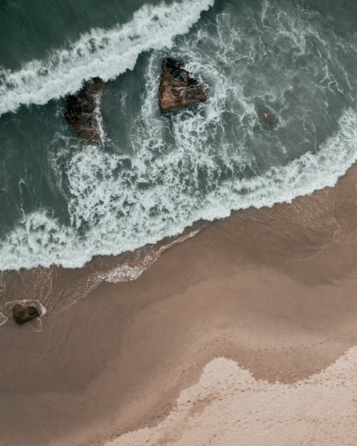 Sea Waves on Beach in Birds Eye View