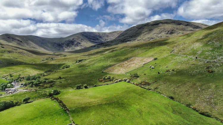 Scenic View Of Green Mountains 