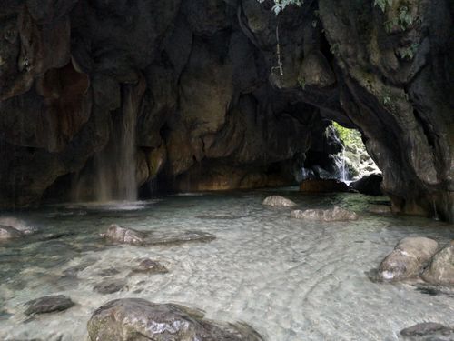 Free Discover the tranquil beauty of a natural grotto and waterfall in Pinal de Amoles, Mexico. Stock Photo