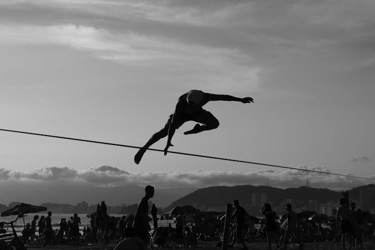 Man Jumping On The Beach 