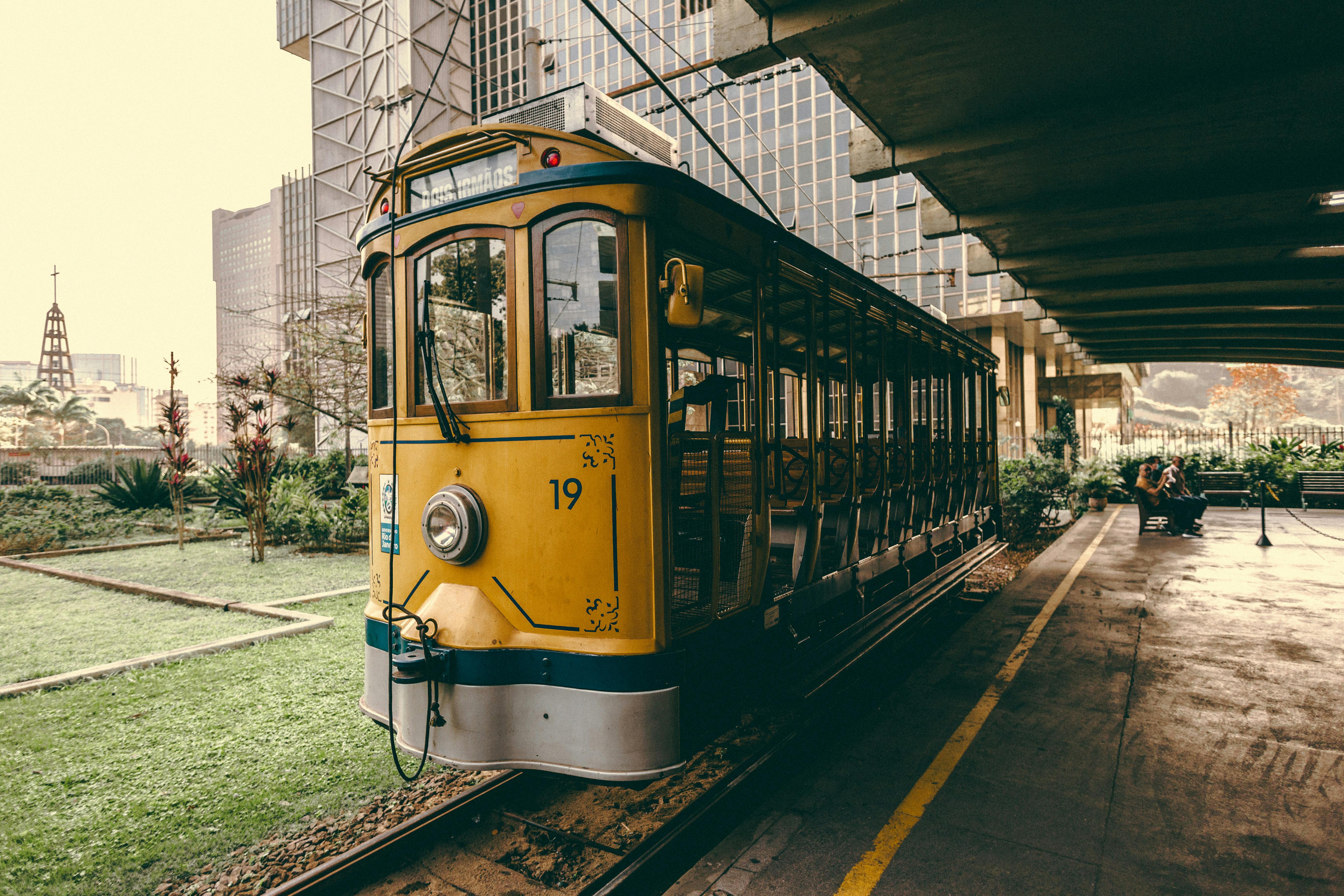 Santa Teresa Tram Near City Buildings · Free Stock Photo