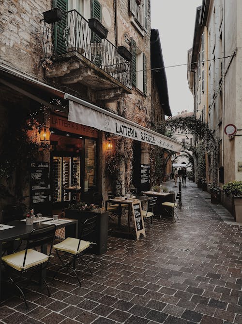 A Table and Chairs on the Street