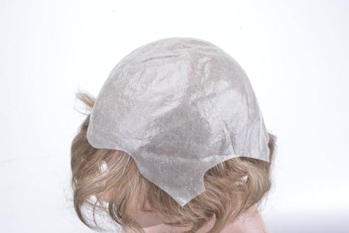 Head Covered with a Plastic Cap 